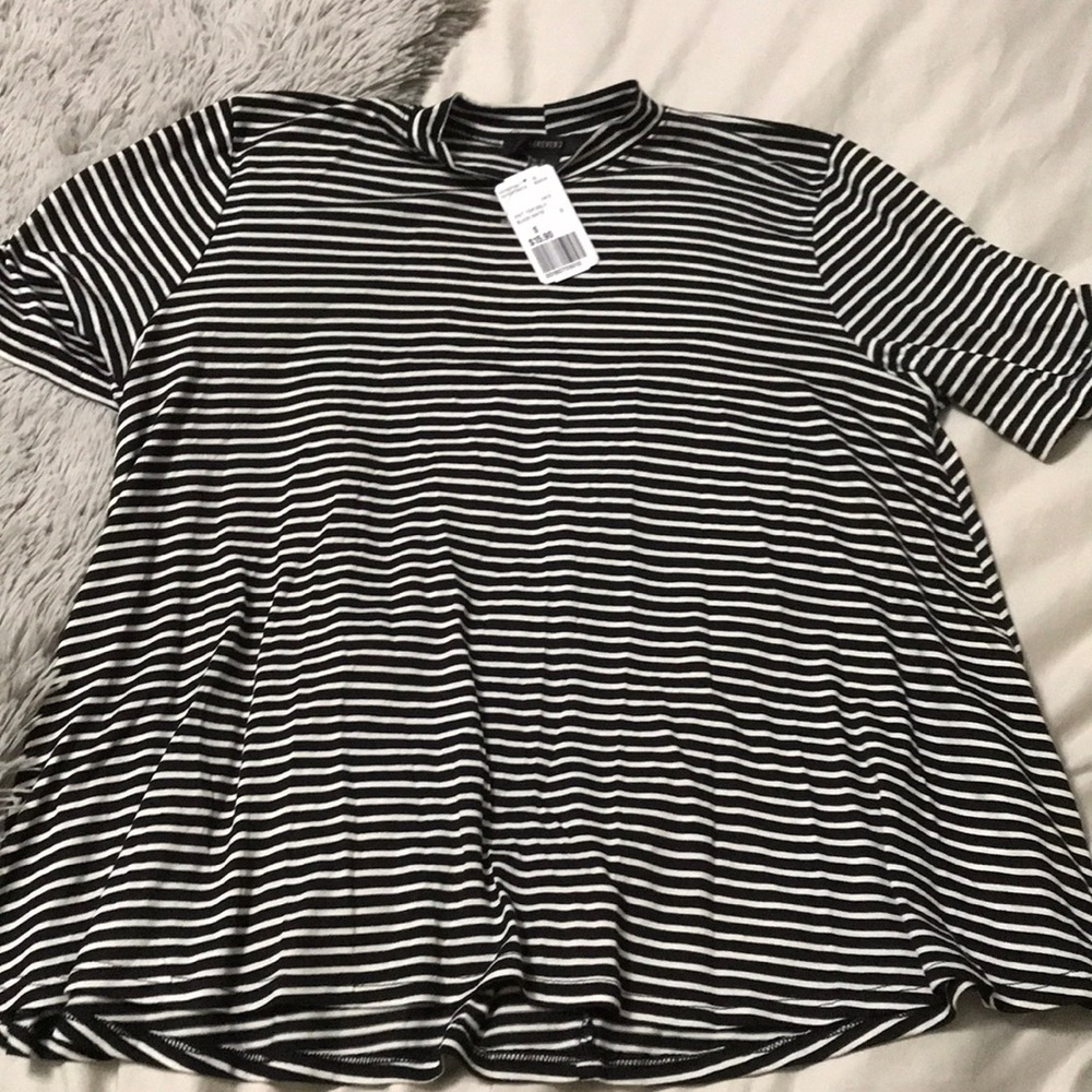 Never worn. Women’s high neck striped swing top